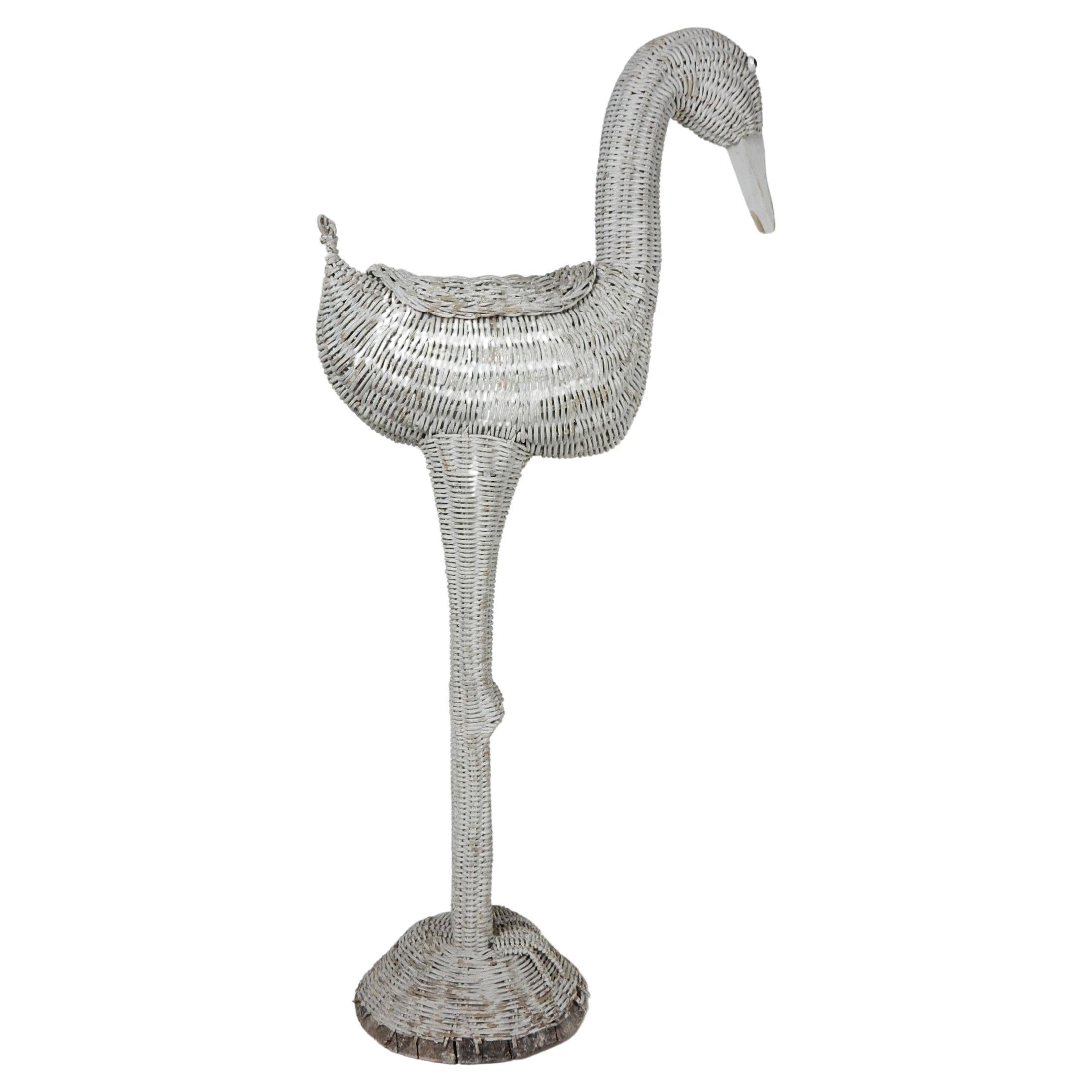 Vintage painted wicker stork or flamingo planter stand.
Circa 1970's or older. Classic old world charm with aged patina.
Holds a 3