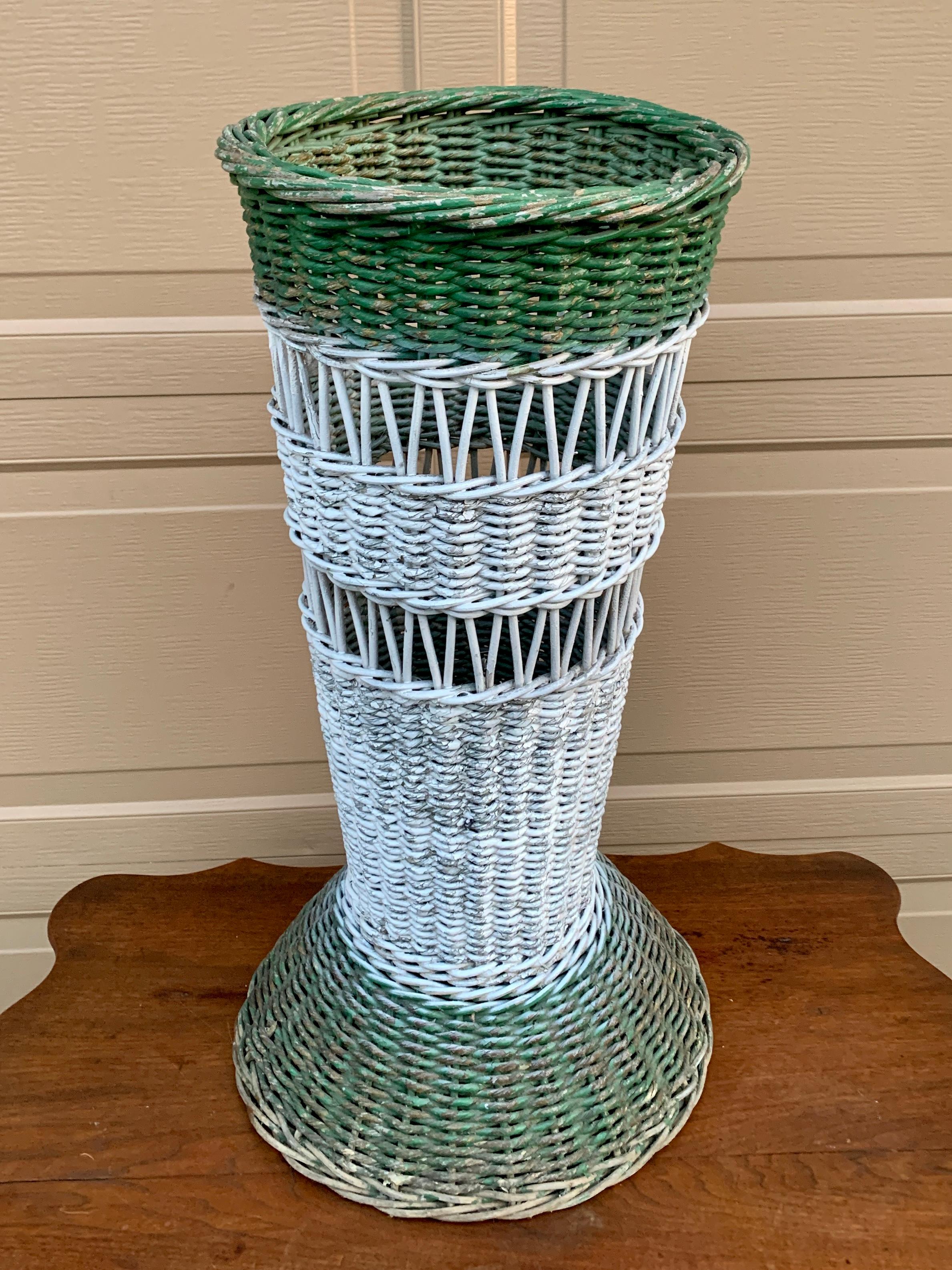A gorgeous Victorian woven wicker umbrella or cane basket painted in white and green, perfectly wonky to add character to any space

USA, Late 19th Century

Measures: 13.5