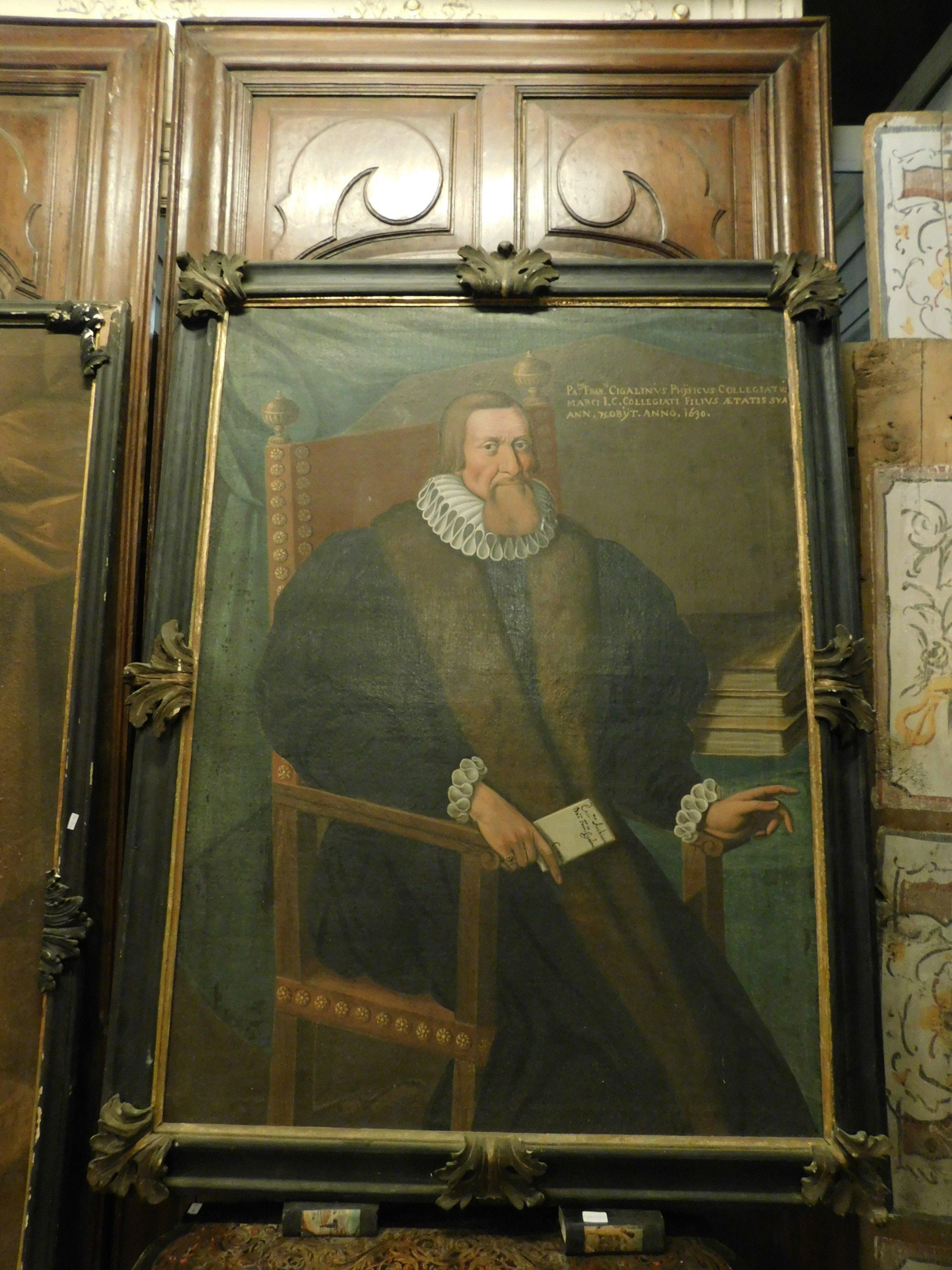 Ancient painting depicting a member of the noble family of Como: I Cigalini; hand painted in the 17th century with Coeval lacquered wood frame. At the top right there is a description of him: 