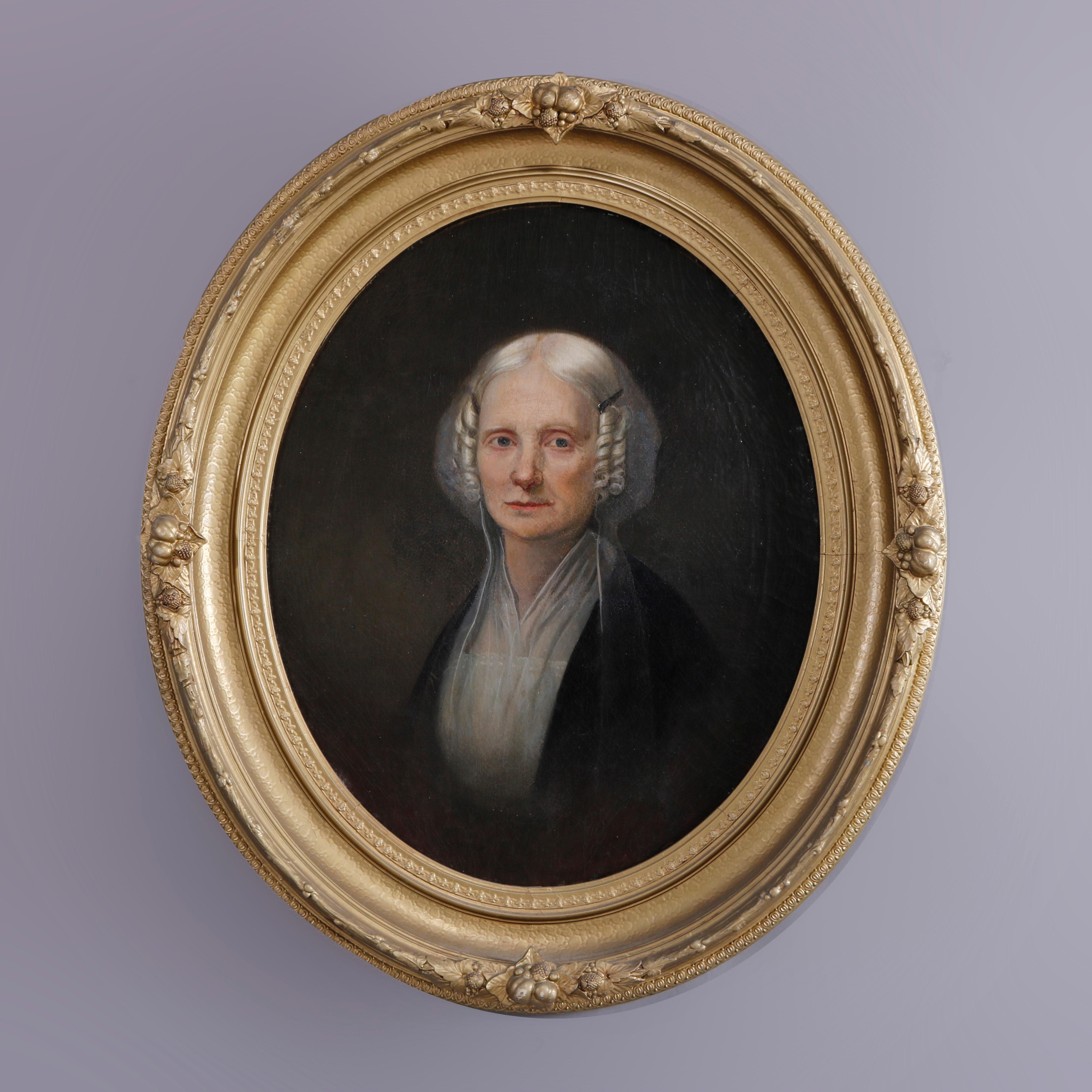 An antique painting offers oil on canvas portrait of a woman, seated in an oval giltwood frame, c1880

Measures - 35.25'' H x 30.25'' W x 4'' D; sight 22'' x 27''.