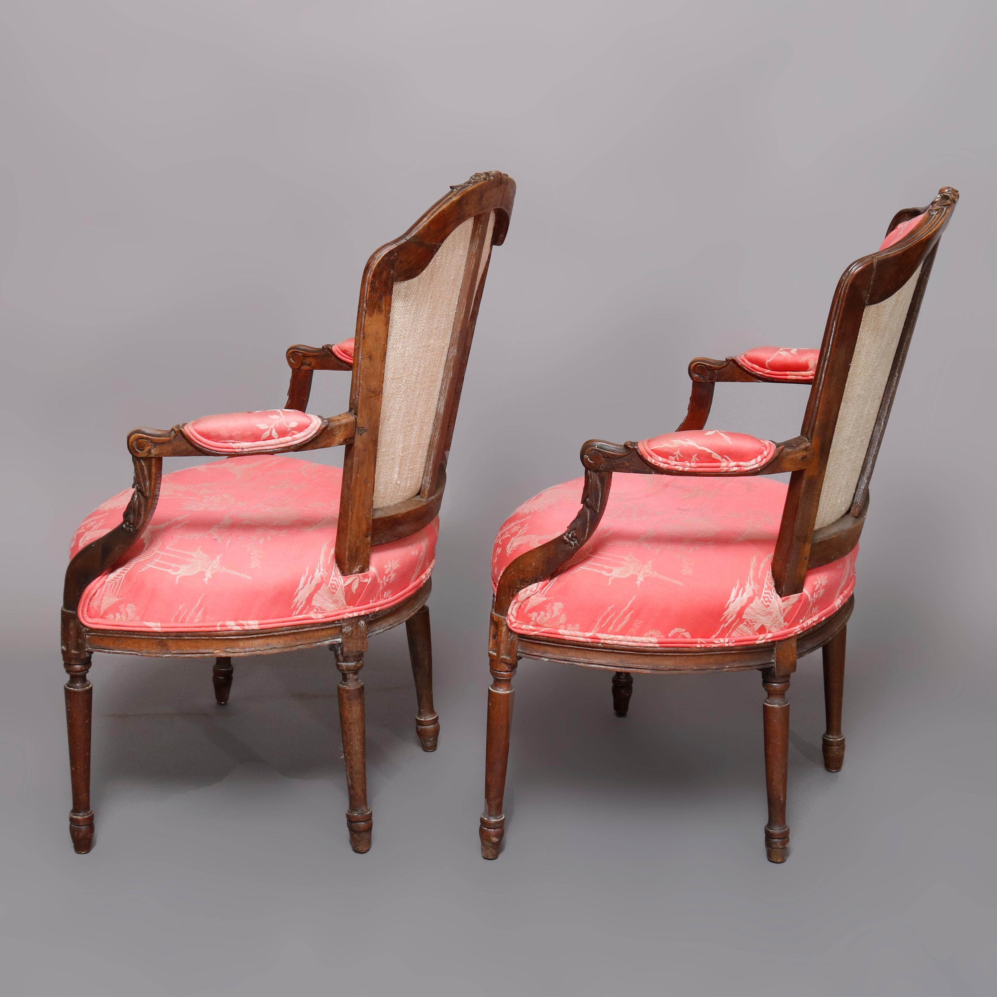 European Pair of 18th Century French Louis XVI Carved Fruitwood and Upholstered Armchairs