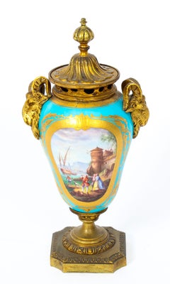 Pair of Bleu Celeste Sevres Porcelain Gilt Bronze Lidded Urns, 19th Century