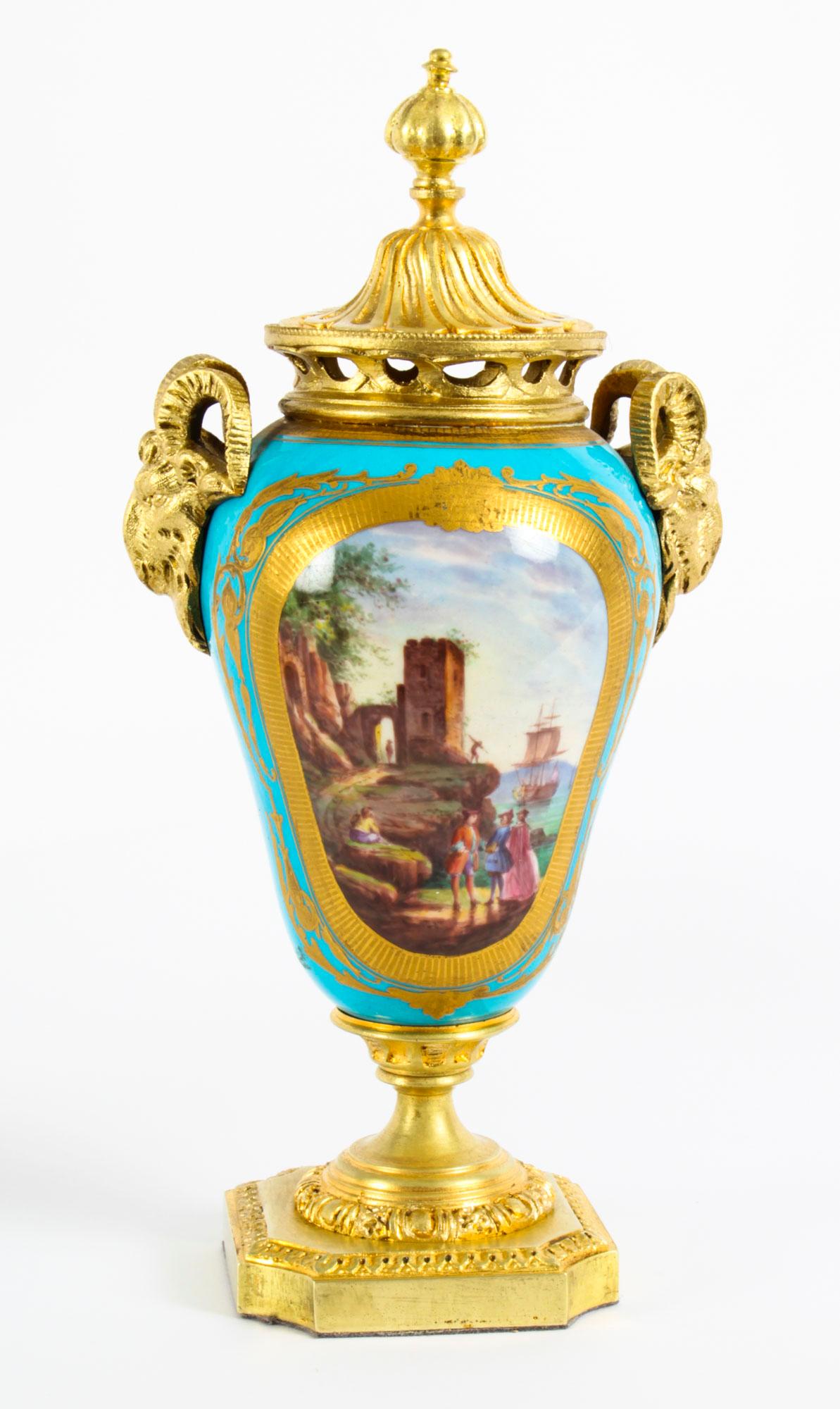 Antique Bleu Celeste Sèvres Porcelain Gilt Bronze Lidded Urns 19th Century, Pair In Good Condition In London, GB