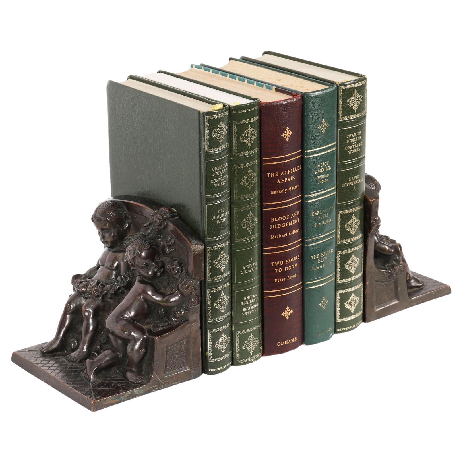 Antique Pair Bronze Classical Cupid Sculptures/ Bookends by K&O 20th Century For Sale