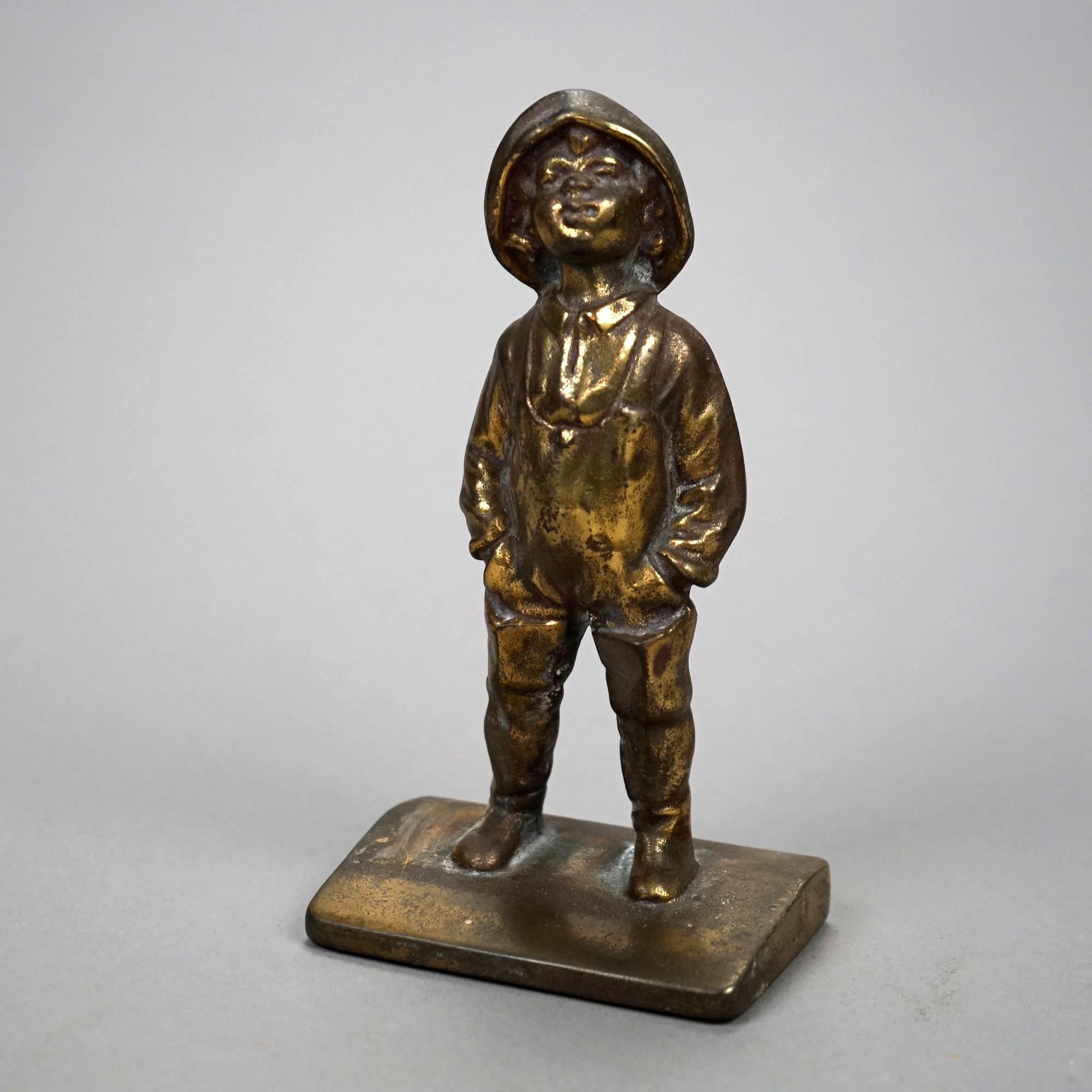 An antique pair of figural bookends offer bronzed cast metal sculpture of young boy street urchin, c1920

Measures- 7''H x 4''W x 2.5''D

Catalogue Note: Ask about DISCOUNTED DELIVERY RATES available to most regions within 1,500 miles of New York.