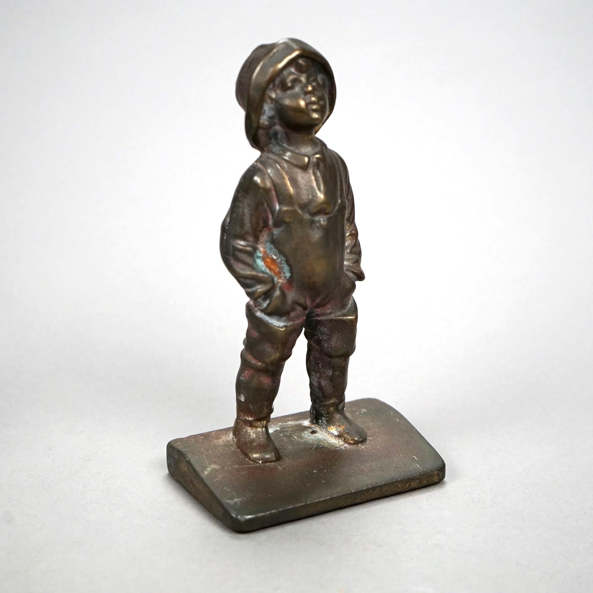 Effet bronze Paire de serre-livres anciens en bronze, Jeune garçon, vers 1920 en vente