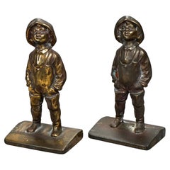 Antikes Paar Bronze-Buchstützen, Junger Junge, um 1920