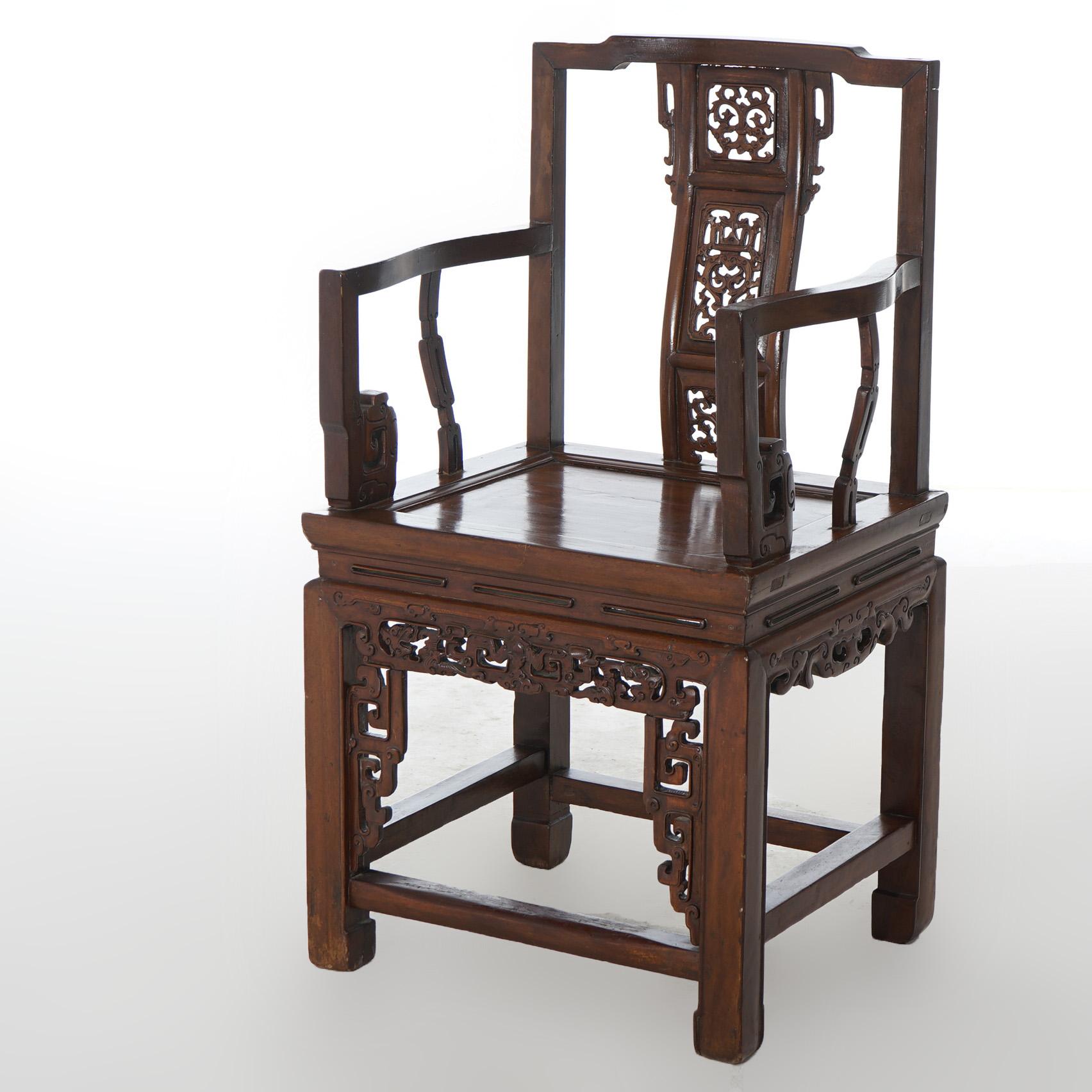 An antique pair of Chinese throne or wedding chairs offer hardwood construction with carved and pierced back splat and raised on straight square legs, c1920

Measures- 40.75''H x 23.5''W x 19''D