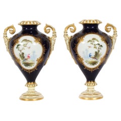 Paire de vases Coalport bleu cobalt par A Perry 19ème siècle