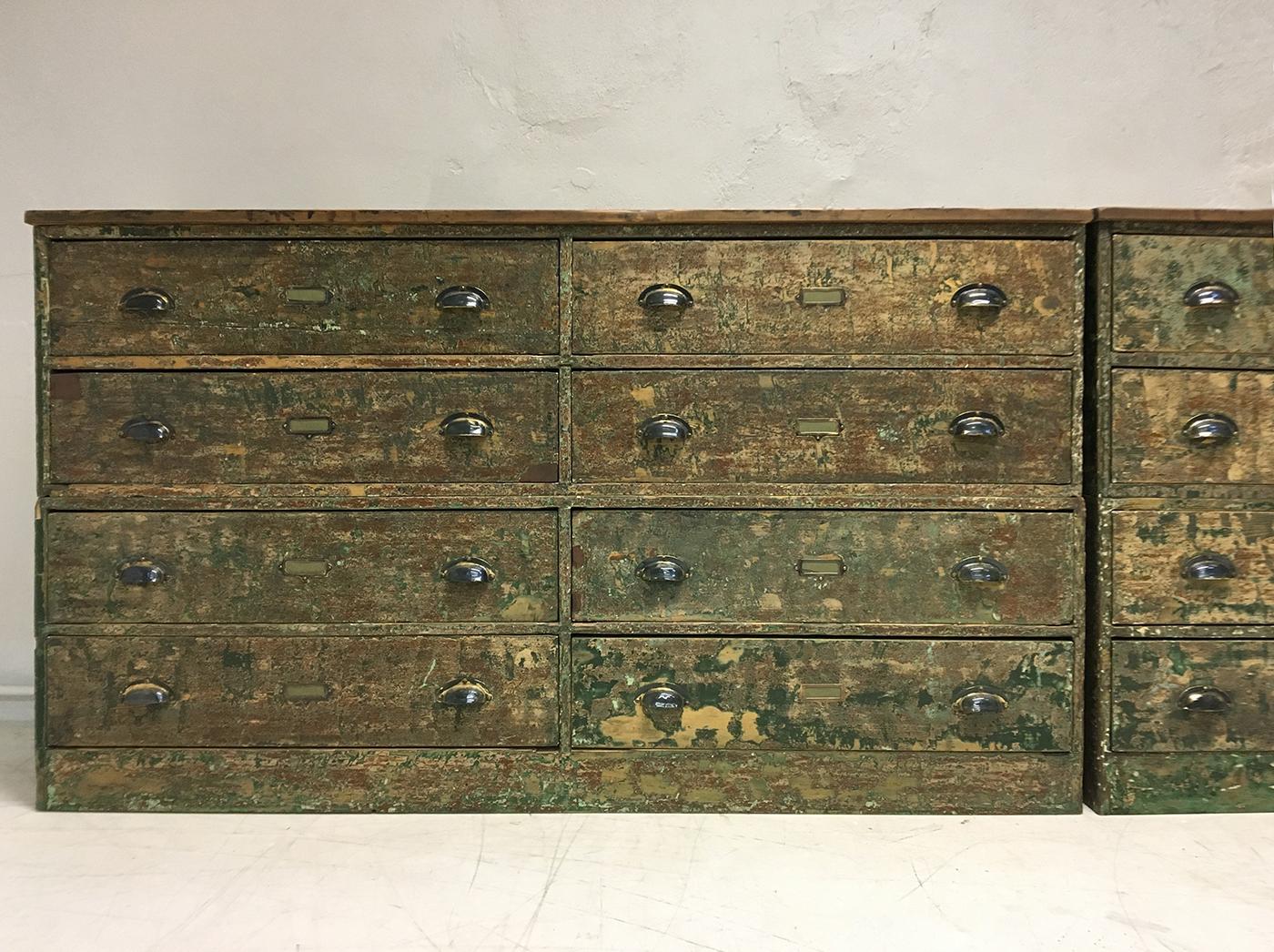 Very attractive scraped pair of early 20th century English pine banks of eight drawers. Originally made and fitted in a local private Girls School, the drawers eventually ended up being used in a haberdashery. Ideal for commercial premises or can be