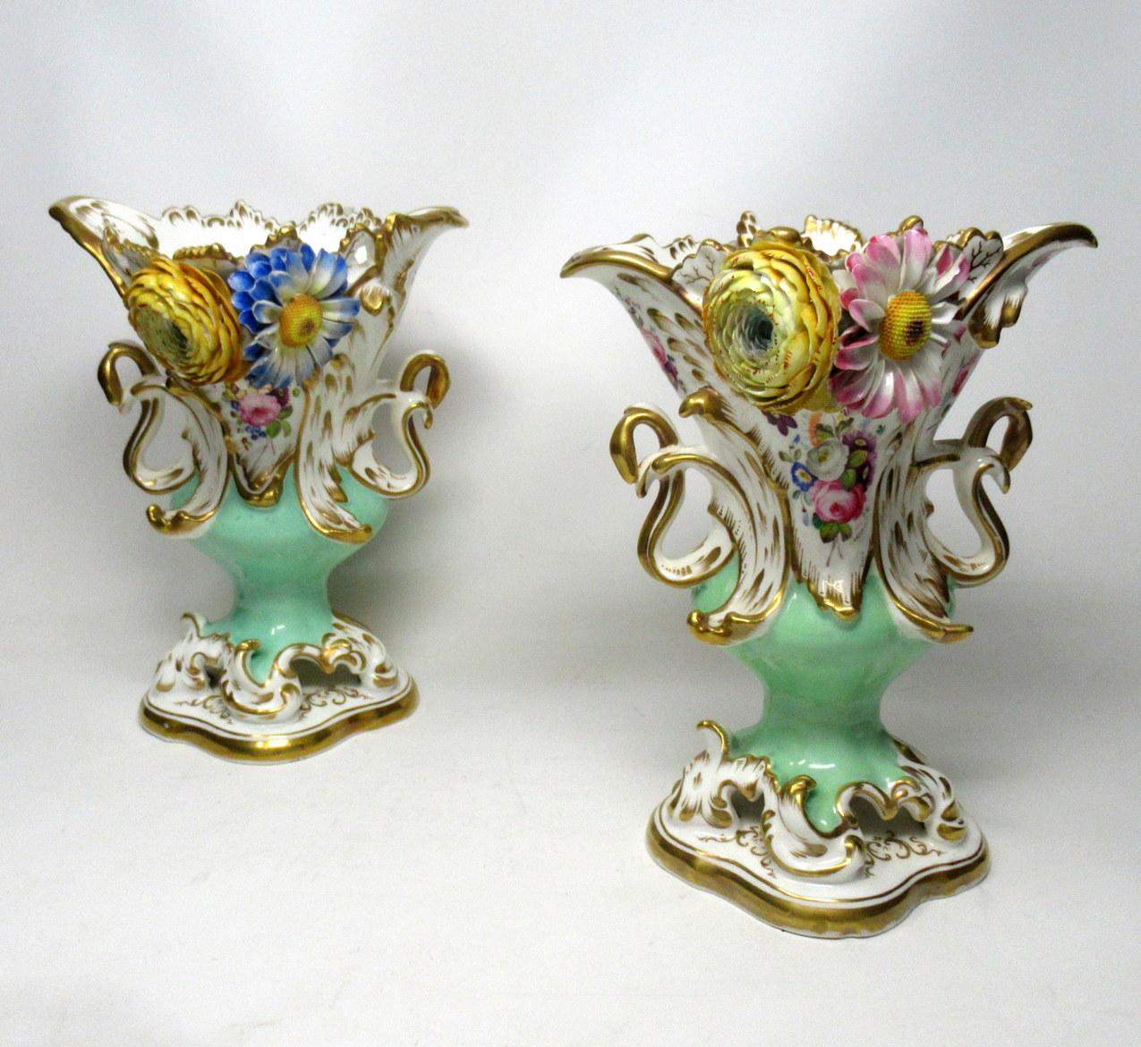 Stunning hand painted English porcelain coalport coalbrookdale flower encrusted vases of good size proportions, circa 1830s-1840s. 

Each vase with flair shaped rim with lavish applied hand painted flowers depicting Anemones, Daisies and