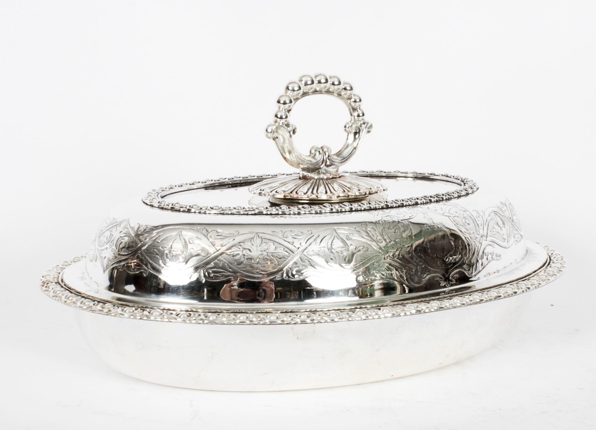 This is an exquisite and rare antique pair of English silver plated entree dishes, bearing the cross arrow mark of T & J Cresswick, Porter Street, Sheffield, circa 1820 in date.
 
They are of oval shape and feature delightful beaded rims, with
