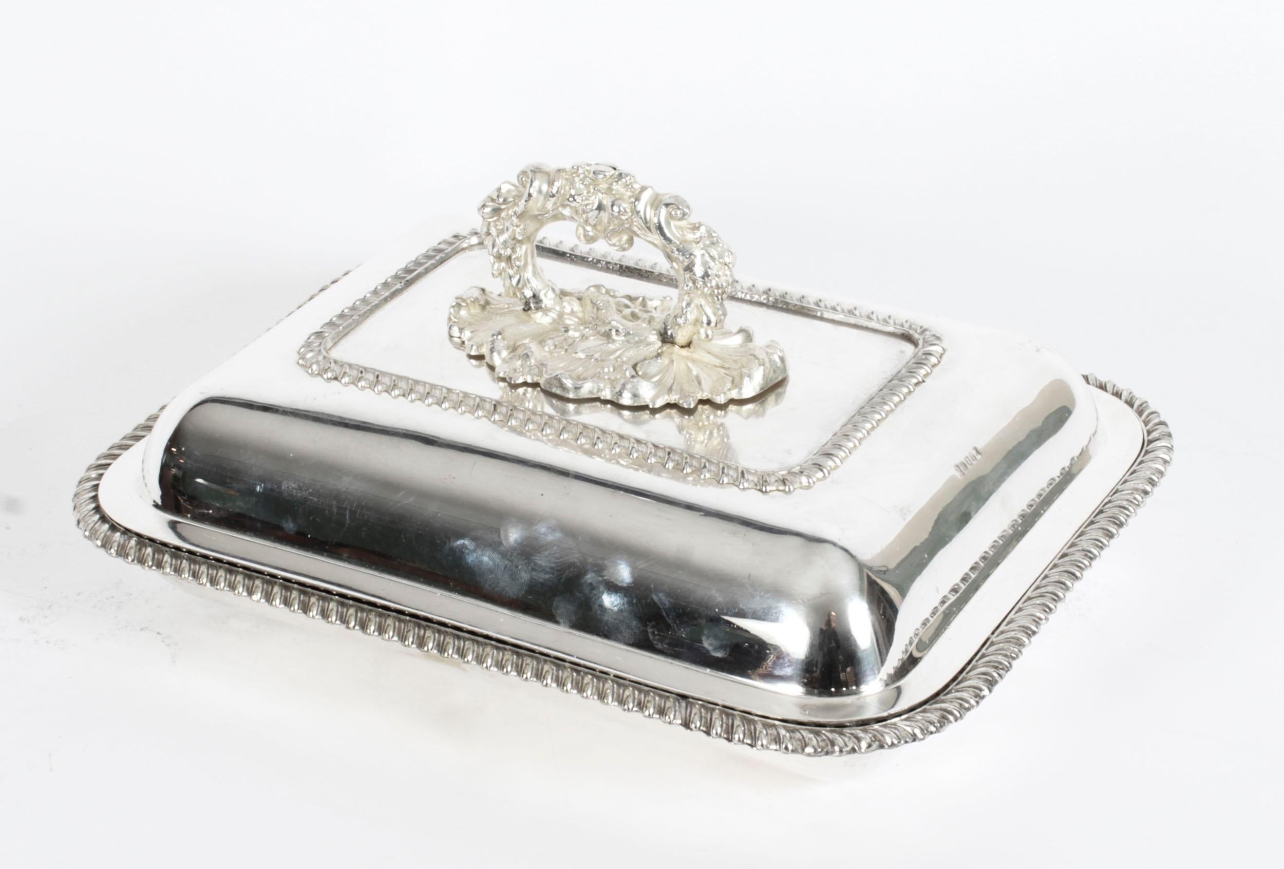 This is an exquisite and rare antique pair of English silver plated entree dishes, bearing the makers mark of Matthew Linwood of Birmingham, circa 1820 in date.
 
The dishes feature a rectangular shape with delightful matching beaded rims to the