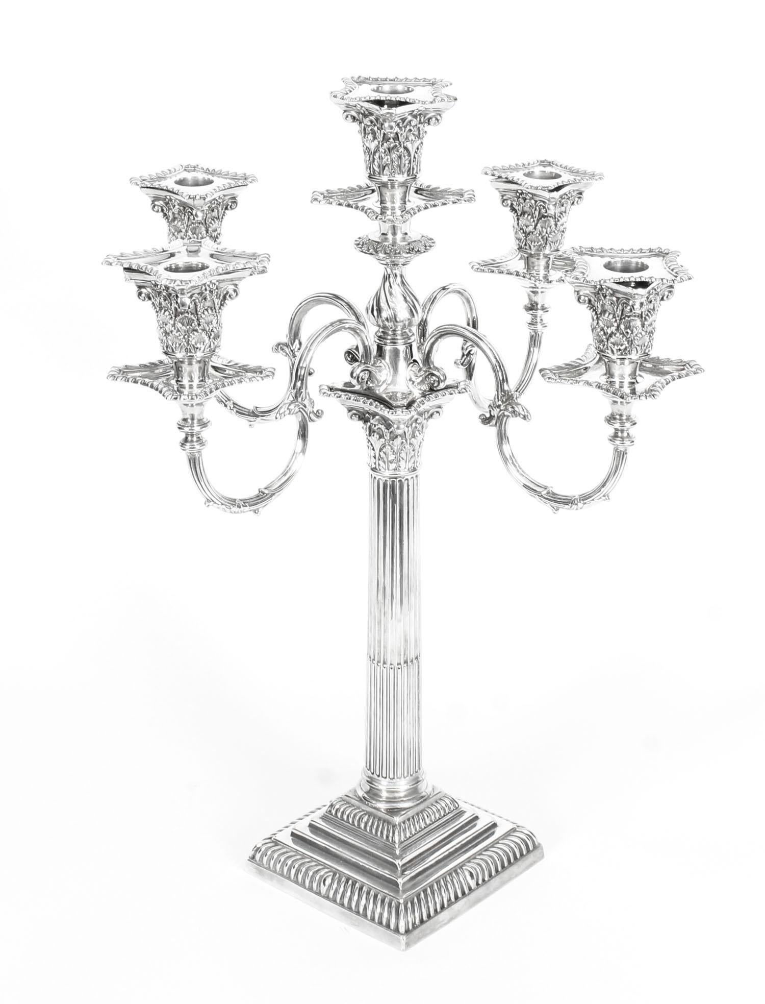 This is a magnificent high-quality pair of antique English Victorian silver plate five-light candelabra, each bearing the maker's mark of the renowned silversmith, Mappin & Webb - Princes Plate, silversmith to Her Majesty the Queen and to His Royal