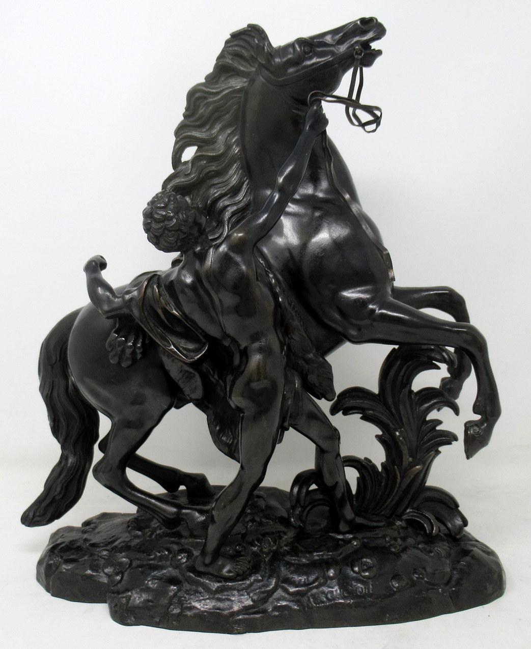 Very fine pair of well cast French Patinated Bronze Representations of the Famous Marley Horses after Guillaume Coustou (French 1677-1746) from the Carrara marble life size originals which were commissioned by Louis XVI for his horse pond at his