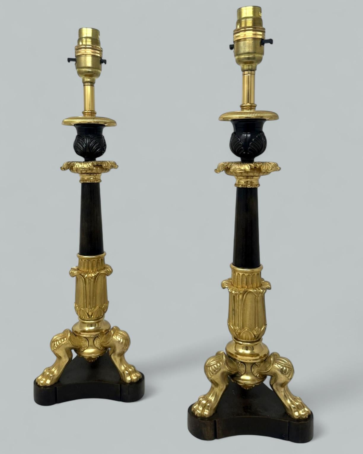 An Exceptionally Fine Pair French Ormolu and patinated Bronze early Victorian Single Light Candlesticks of tall slender form and fairly large proportions, now converted to a stunning Pair of Electric Table Lamps, offered in exceptional condition,