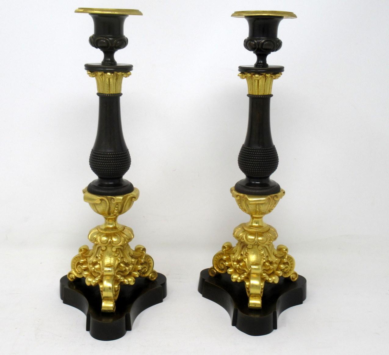 Cast Antique Pair of French Empire Ormolu Patinated Bronze Dore Candlesticks Regency