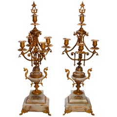 Pair of French Gilt Bronze, Onyx and Champleve Figural Candelabra, 19th Century