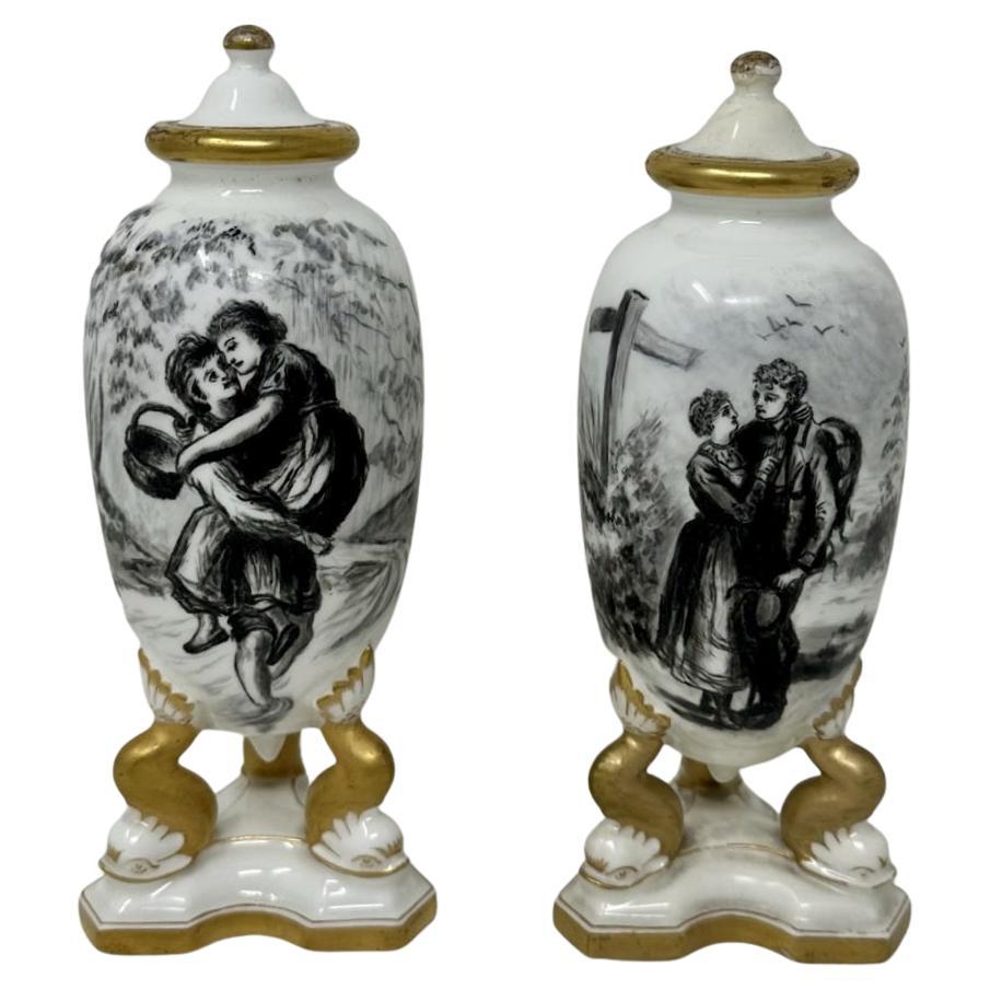 Antique Pair French Gilt Porcelain Vases or Urns En Grisaille Lover Scenes 19ct  For Sale