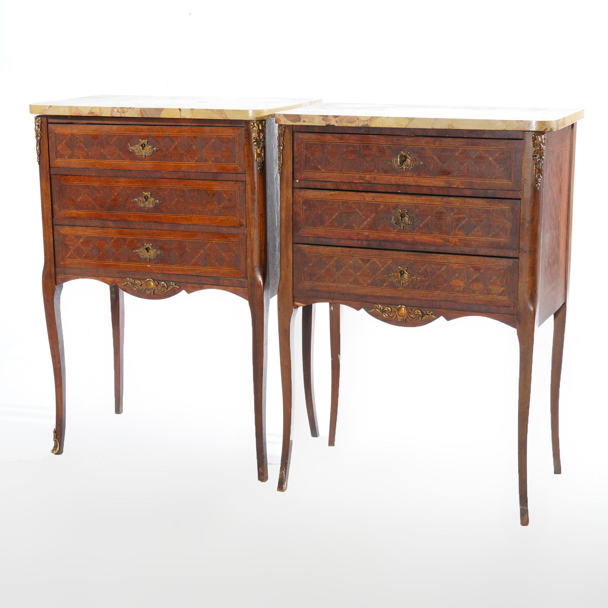An antique pair of French side tables offer specimen marble tops surmounting kingwood cases having three satinwood crossbanded drawers, raised on cabriole legs, foliate cast ormolu mounts throughout, c1910

Measures- 30.5