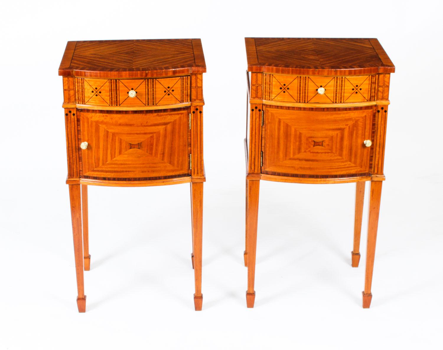 This is a stunning pair of antique French satinwood bow-front bedside cabinets, circa 1890 in date and bearing the embossed metal label of the renowned manufacturer Maple & Co, of London & Paris, this pair made for the Paris showrooms.

They are