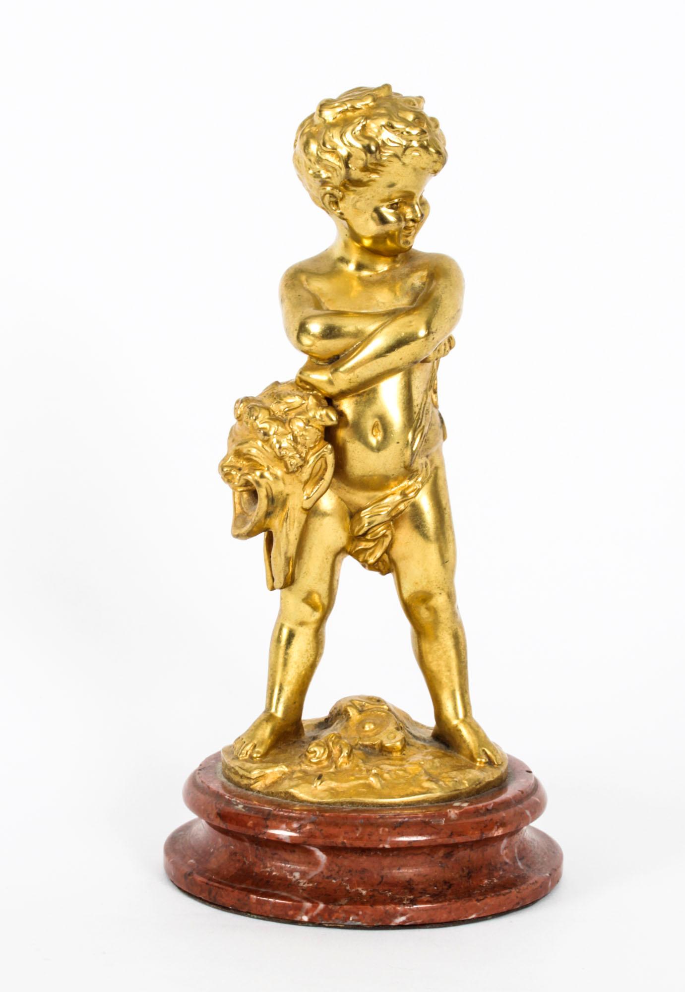 A magnificent antique pair of French gilt bronze figures of cherubs by the renowned French Sculpter Louis Kley (1833-1911), Circa 1860 in date.

They are superbly sculptured representing theatre, both are standing with arms crossed holding bearded
