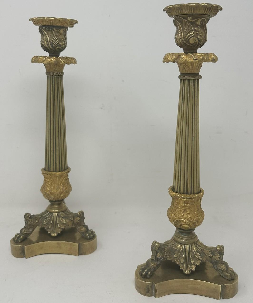 Stunning Pair French Heavy Gauge Ormolu Bronze Dore Single Light Mantle or Table Candlesticks of chisel cast quality and of generous tall proportions. 

Each having a Campana-form leaf cast candle socket with original firm fitting removable foliate