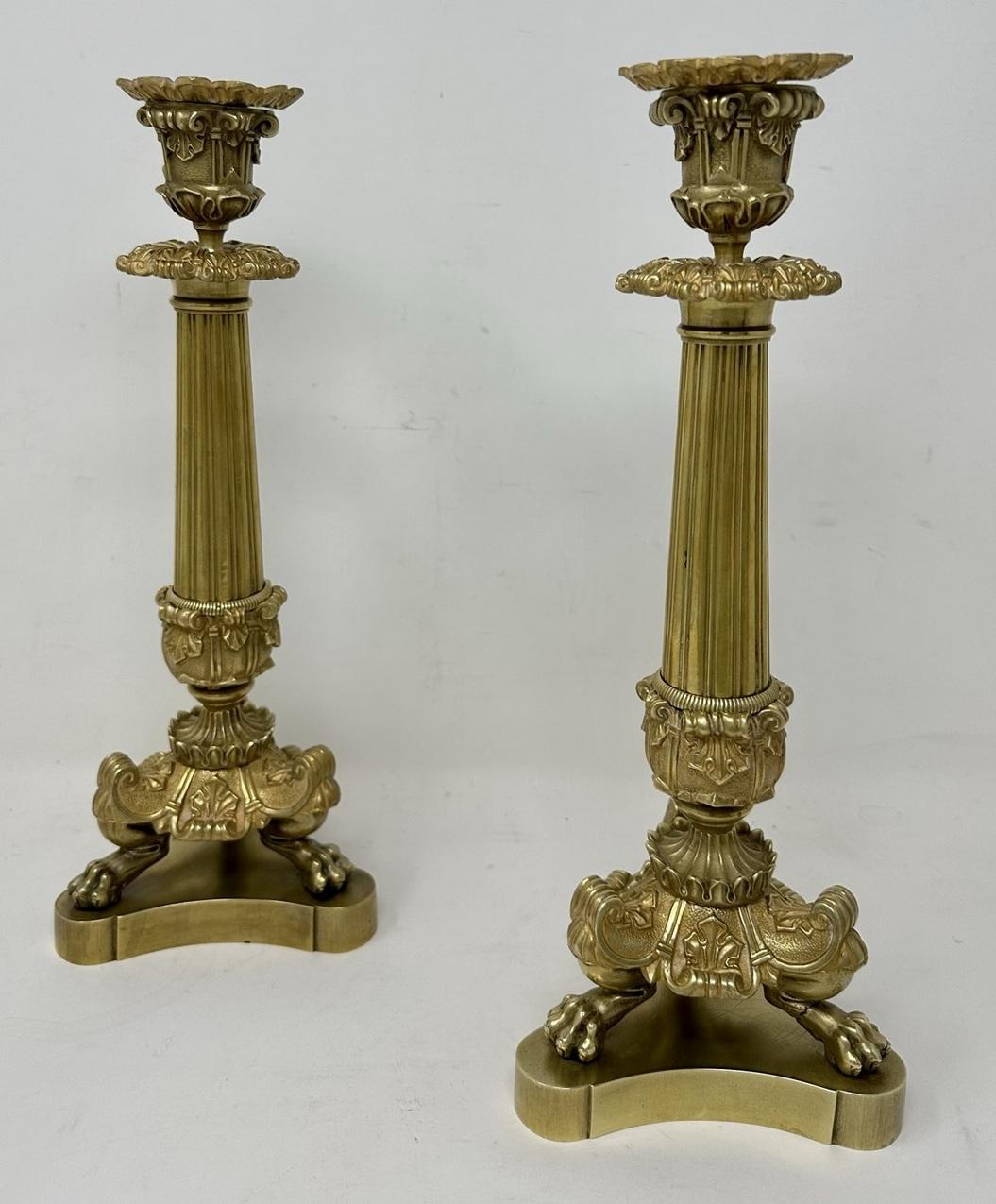 Stunning Pair French Heavy Gauge Ormolu Bronze Dore Single Light Mantle or Table Candlesticks of exhibition quality and of generous tall proportions. 

Each having a Campana-form leaf cast candle socket with original firm fitting removable foliate