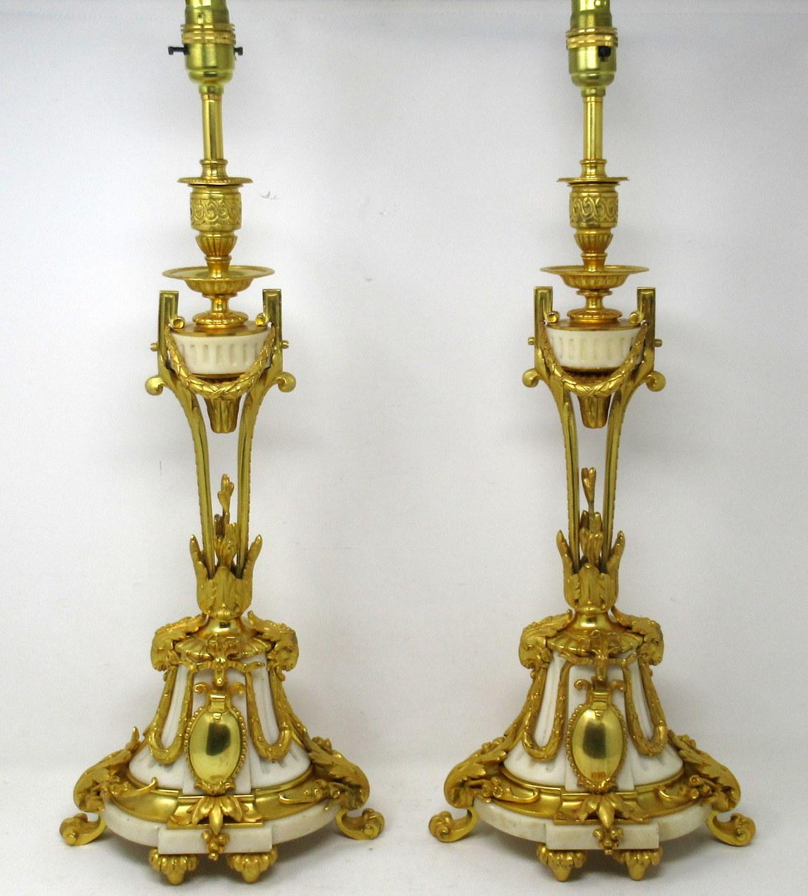 An Exceptionally Fine Quality Pair of French Heavy Gauge Chisel Cast Ormolu-Mounted Statutory Marble Garniture Urns, of elegant tall and generous proportions, of French origin, now professionally converted to a Pair Electrical Table Lamps. First