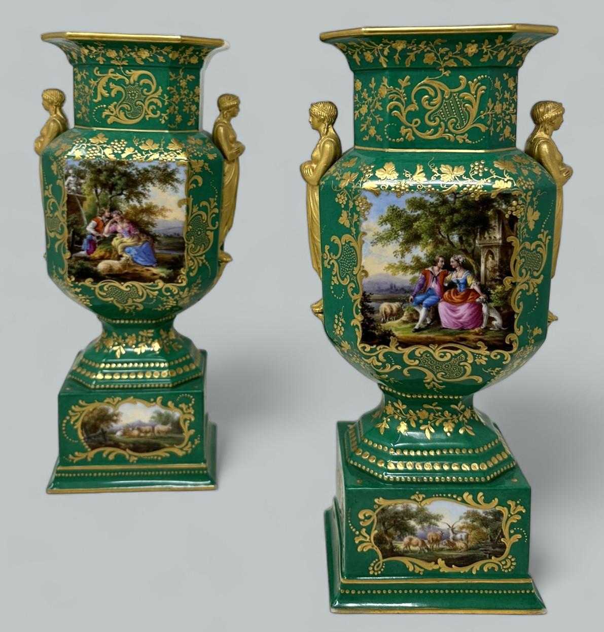 Absolutely Stunning Pair of French Sevres Soft Paste Enameled Porcelain Twin Figured Handle Table or Mantle Urns of traditional square form with canted corners and of outstanding Museum quality, and good size proportions, each raised on a square