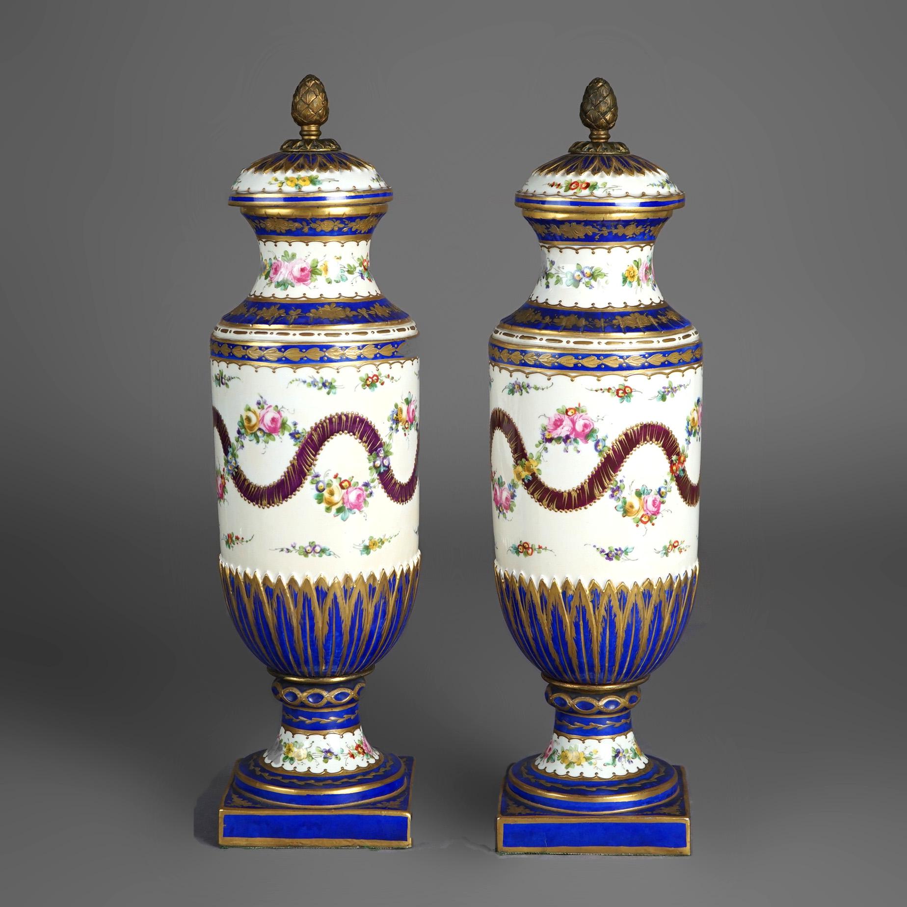 Antique Pair French Sevres Porcelain Hand Painted & Gilt Decorated Bolted Urns, c1890

Measures - 14.75