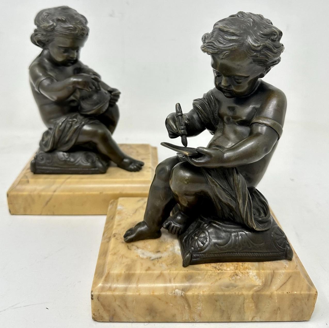 A Rare Antique Pair of Grand Tour Patinated Bronze allegorical seated Putto after Italian Neoclassical Artist Antonio Canova, complete with their original well veined Sienna Marble stepped rectangular bases. Circa second quarter of the Nineteenth