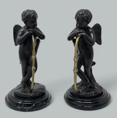 Coppia antica di putti putti in bronzo in stile Grand Tour francese dopo Augustuste Moreau