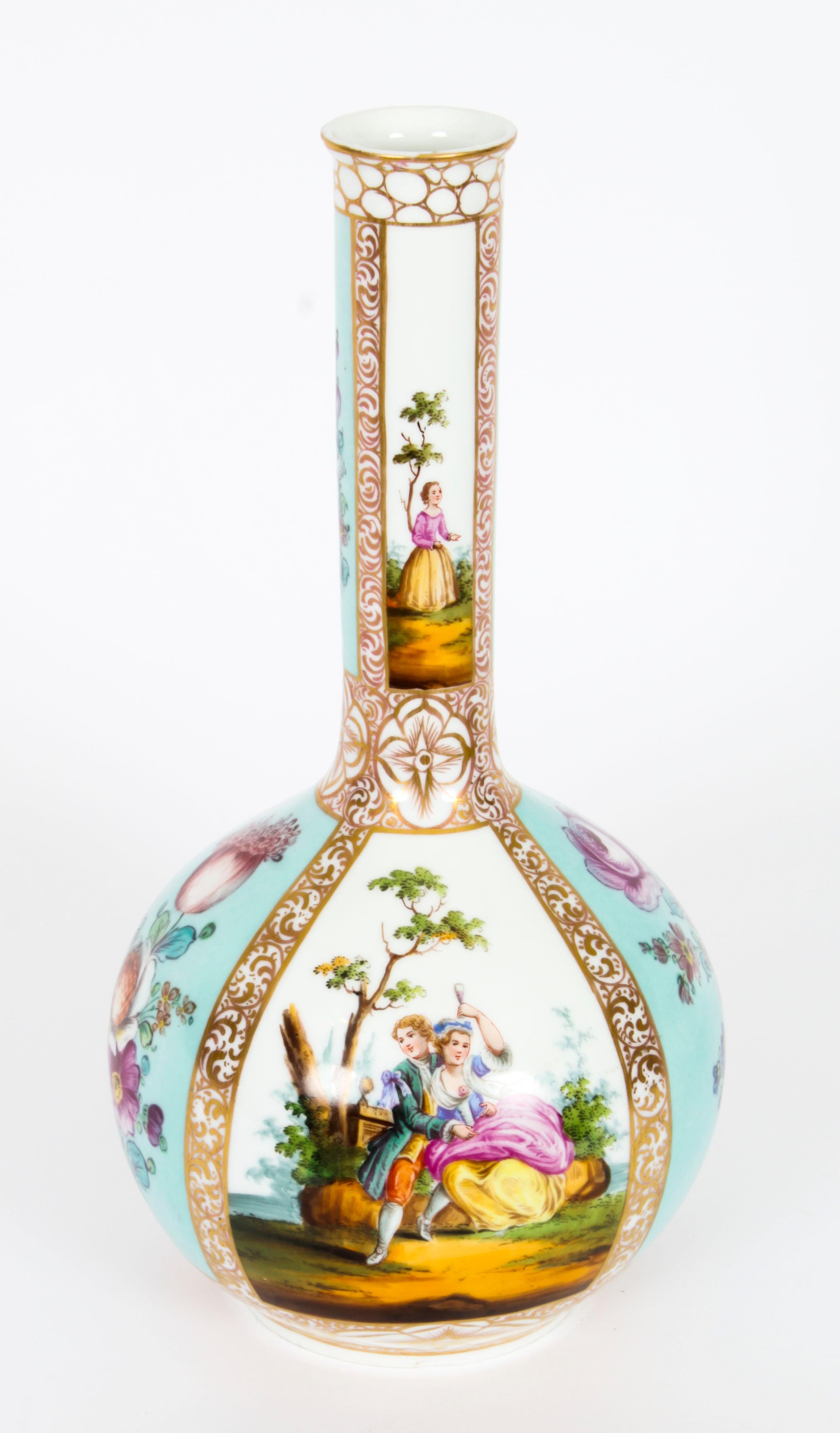 This is a beautiful antique pair of Helena Wolfsohn Augustus Rex club Dresden porcelain vases and covers, circa 1850 in date.
 
Each ovoid shaped vase features blue and white panels, hand painted with figures and floral spray and finished with gilt