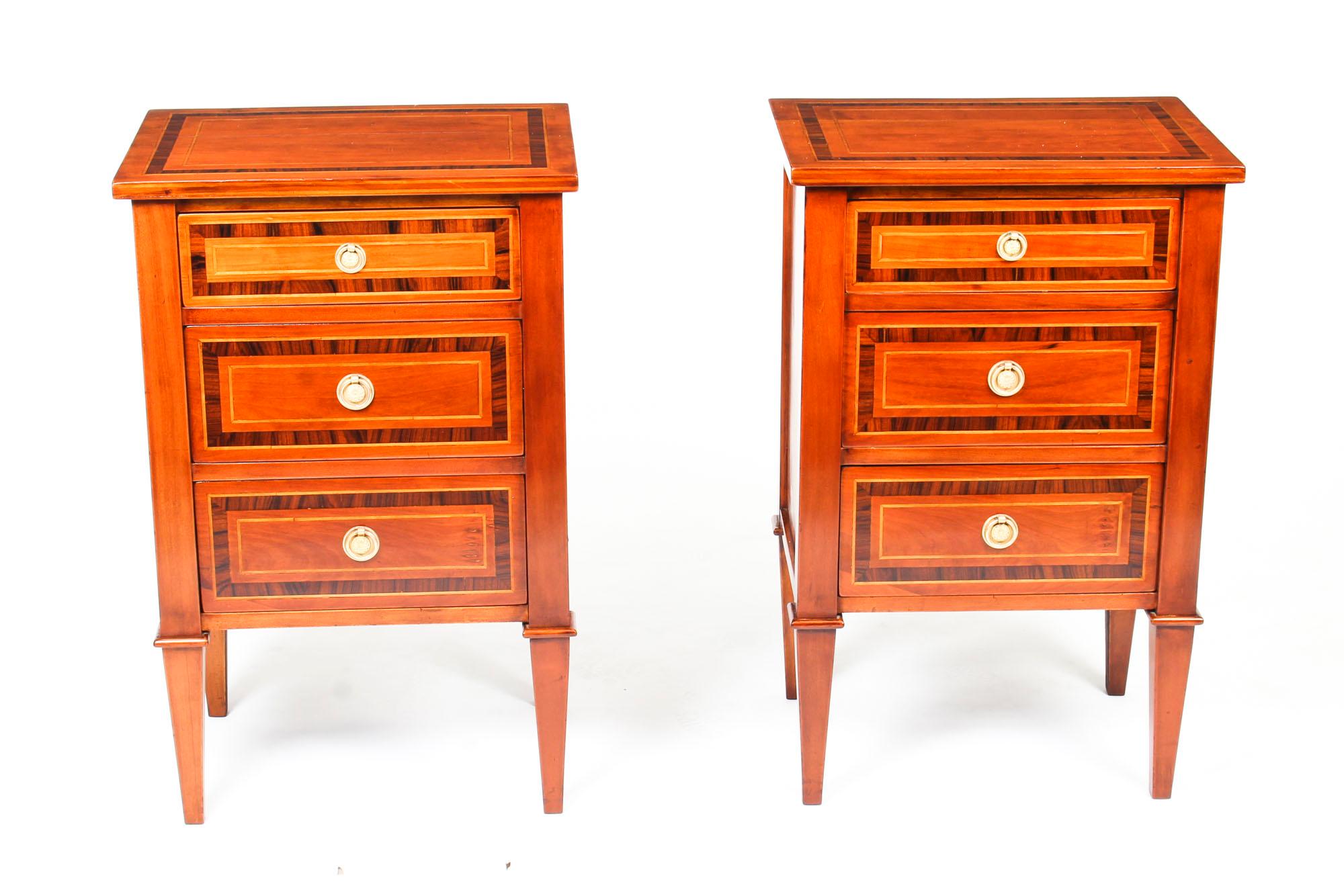 This is a stunning pair of Antique Italian flame mahogany bedside chests, circa 1870 in date.

They are crafted from flame mahogany which has been crossbanded in beautiful Gonçalo Alves with boxwood line inlaid decoration.

They each have a bank