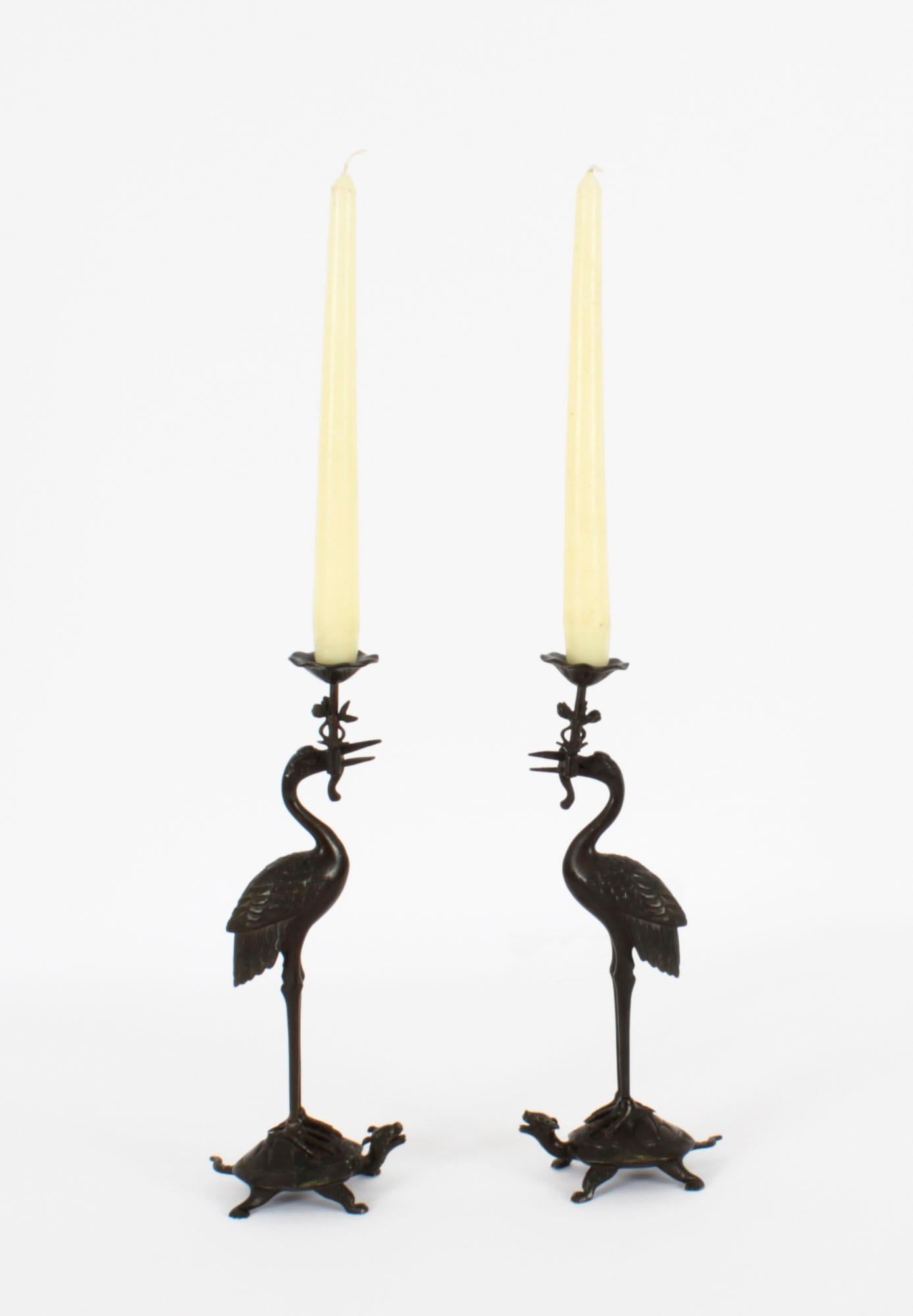 A delightful pair of Antique Japanese bronze stork figural pricket candlesticks, dating from the mid 19th Century.

There is no mistaking their unique quality and design, which is sure to be cherished by any admirer of Japanse artifacts.
