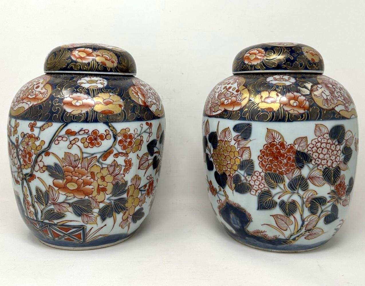 Stunning Pair of large early Meiji period Imari heavy gauge earthenware Rouleau Japanese Ginger Jar Vases of generous size. These beautiful hand decorated heavy gauge-ware vases were made during the Meiji period (1868-1912), in this distinctive and