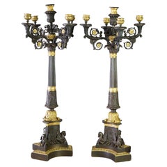 Paire de grands candélabres figuratifs Empire français en bronze doré 19ème siècle