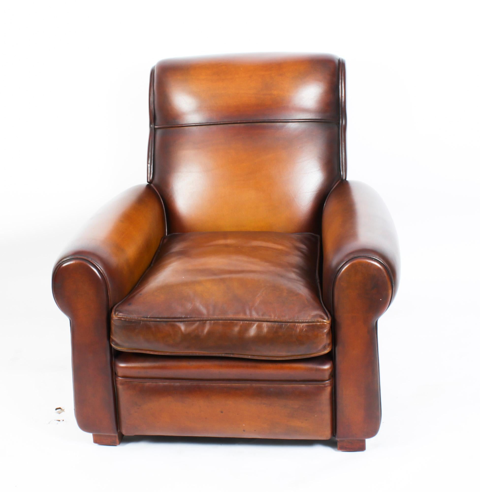 This is an absolutely fabulous antique pair of English leather Club armchairs, circa 1900 in date.
 
With shaped back and loose cushions they are a really comfortable pair of chairs, ready for you to relax in comfort.
 
The hand dyed leather is