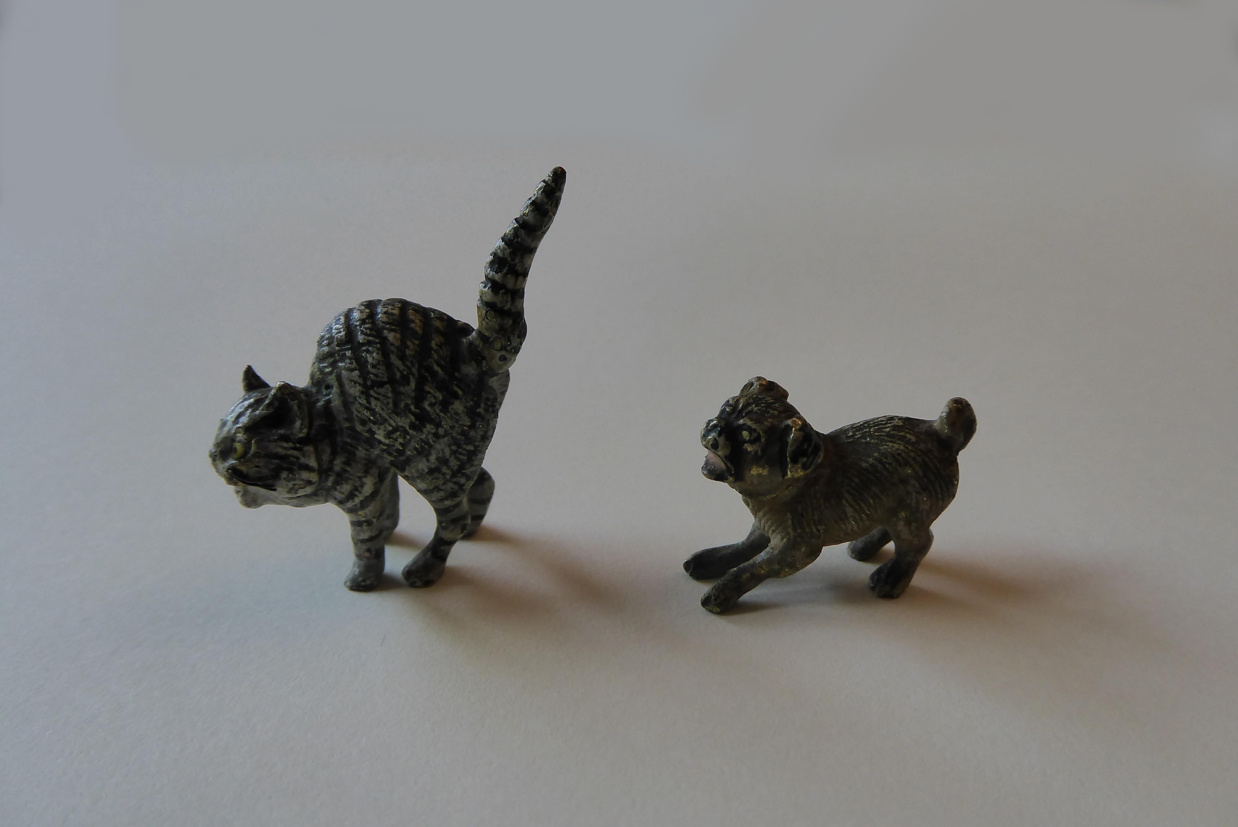 Antique pair of miniature Austrian cold painted bronze cat and dog, circa 1900. Approximate cat measurements:
2cms x 3cms
approximate dog measurements:
2cms x 2cms.
