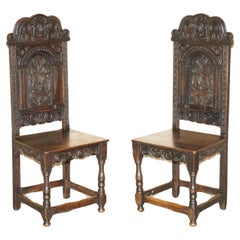 ANTIQUE PAIR OF 17TH CENTURY JACOBEAN ENGLISH OAK CHAIRS FROM THE FILM HELLBOy