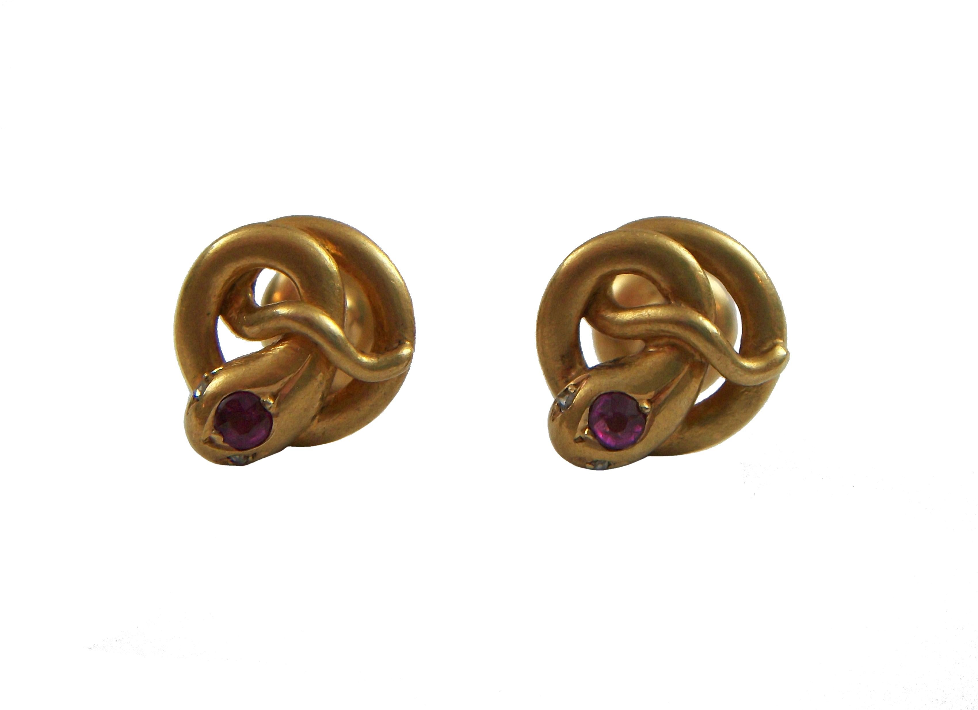 Exceptional pair of antique 18K yellow gold snake buttons - featuring coiled snakes to each button front (signifying eternal love and commitment) with a single ruby to each snake head (approx. 0.20 Total Carat Weight - 0.102 each) - small rose cut