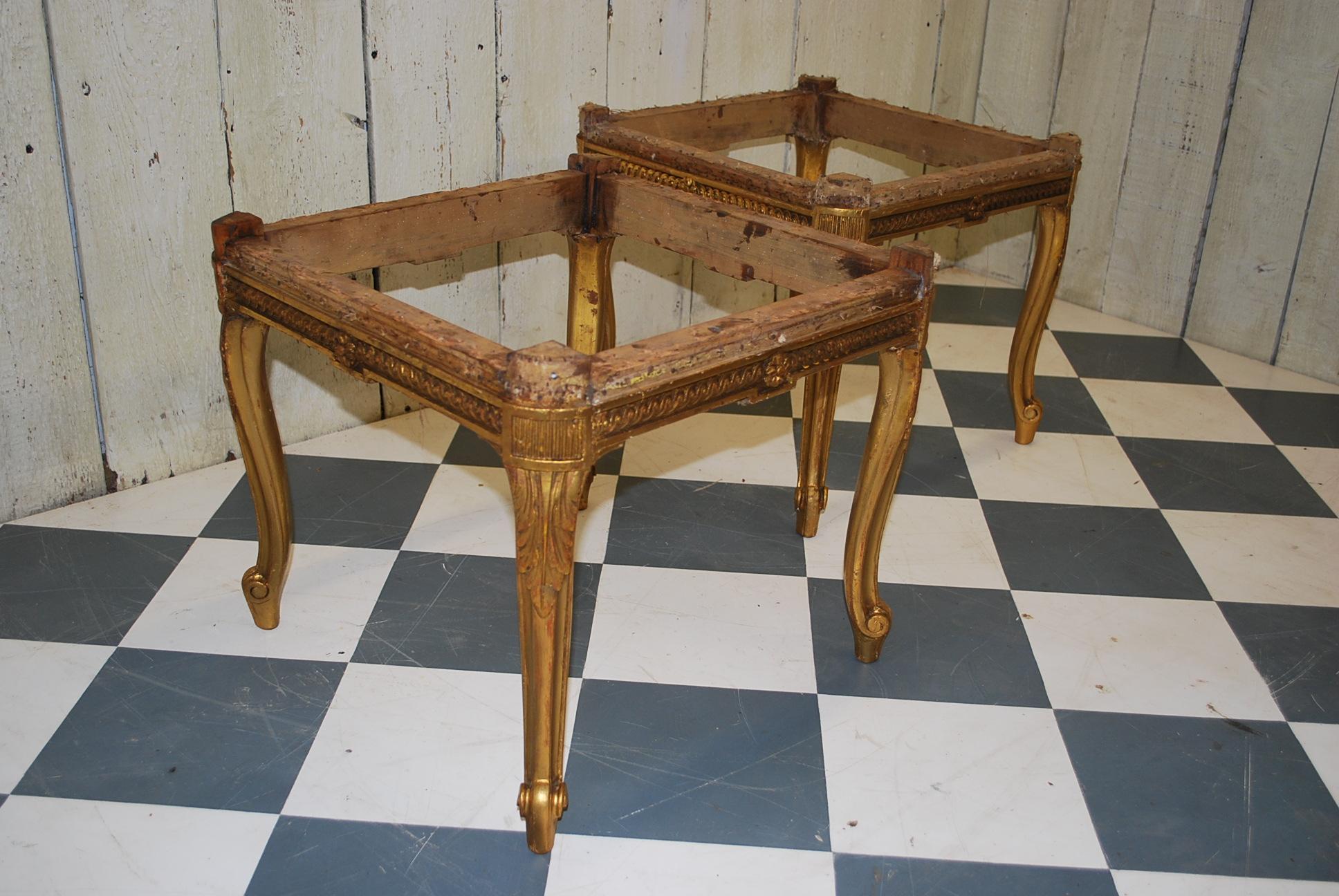 A lovely antique pair of French giltwood stools in the neoclassical taste, ready for re upholstery. Structurally sound and ready for covering in fabric. The pair come with original horse hair swabs.