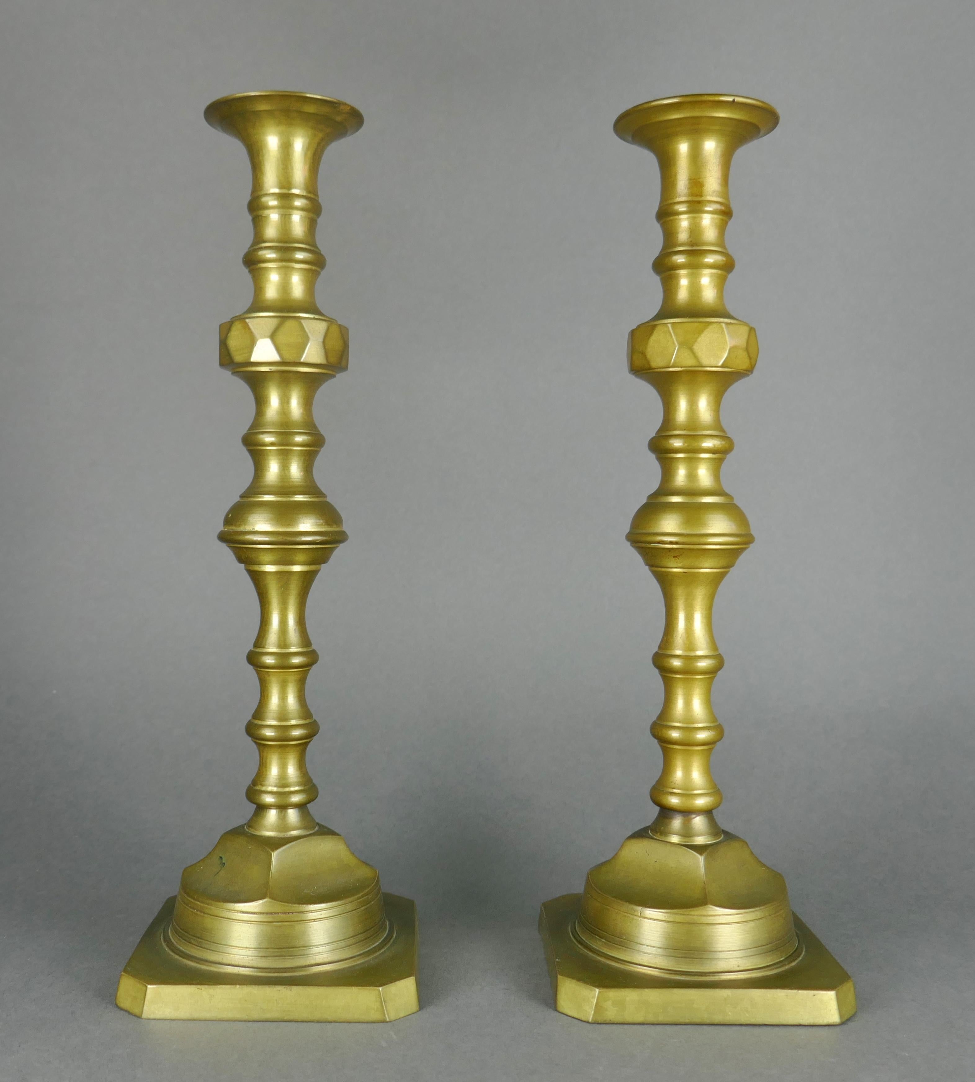 Cast Bronze Candlesticks circa 1870. They were initially gilt gold, which is quite dulled except on the underside. They are striking. 