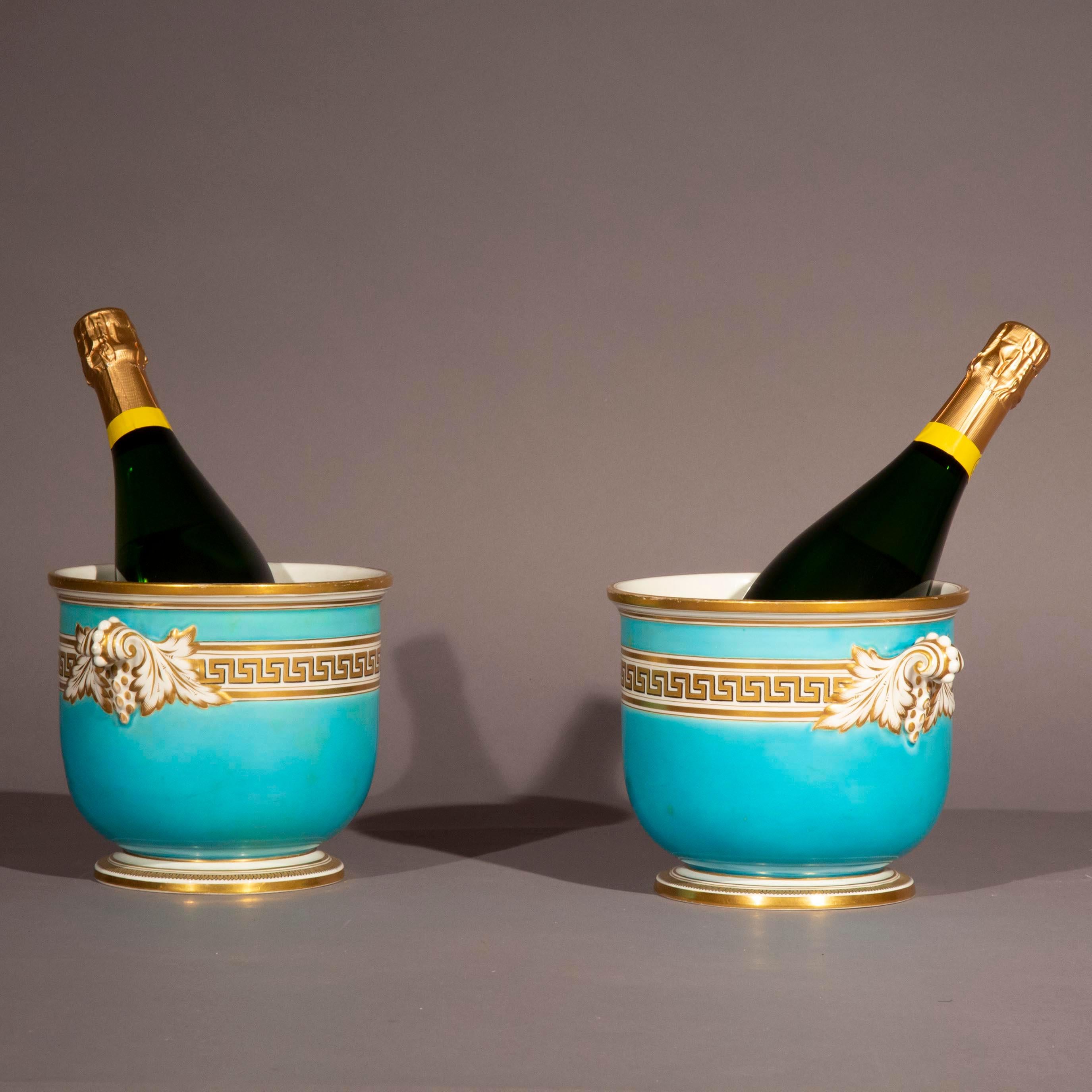 A decorative pair of porcelain cache-pots or planters with Greek key decoration

France, mid-19th century.

Why we like them

Of beautiful sky-blue colour with gold accents, these pots are very pretty and versatile. Perfect for flowers or