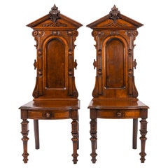 Antique Pair of American High Back Walnut Renaissance Revival Carved Hall Chairs