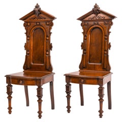 Antique Pair of American High Back Walnut Renaissance Revival Carved Hall Chairs