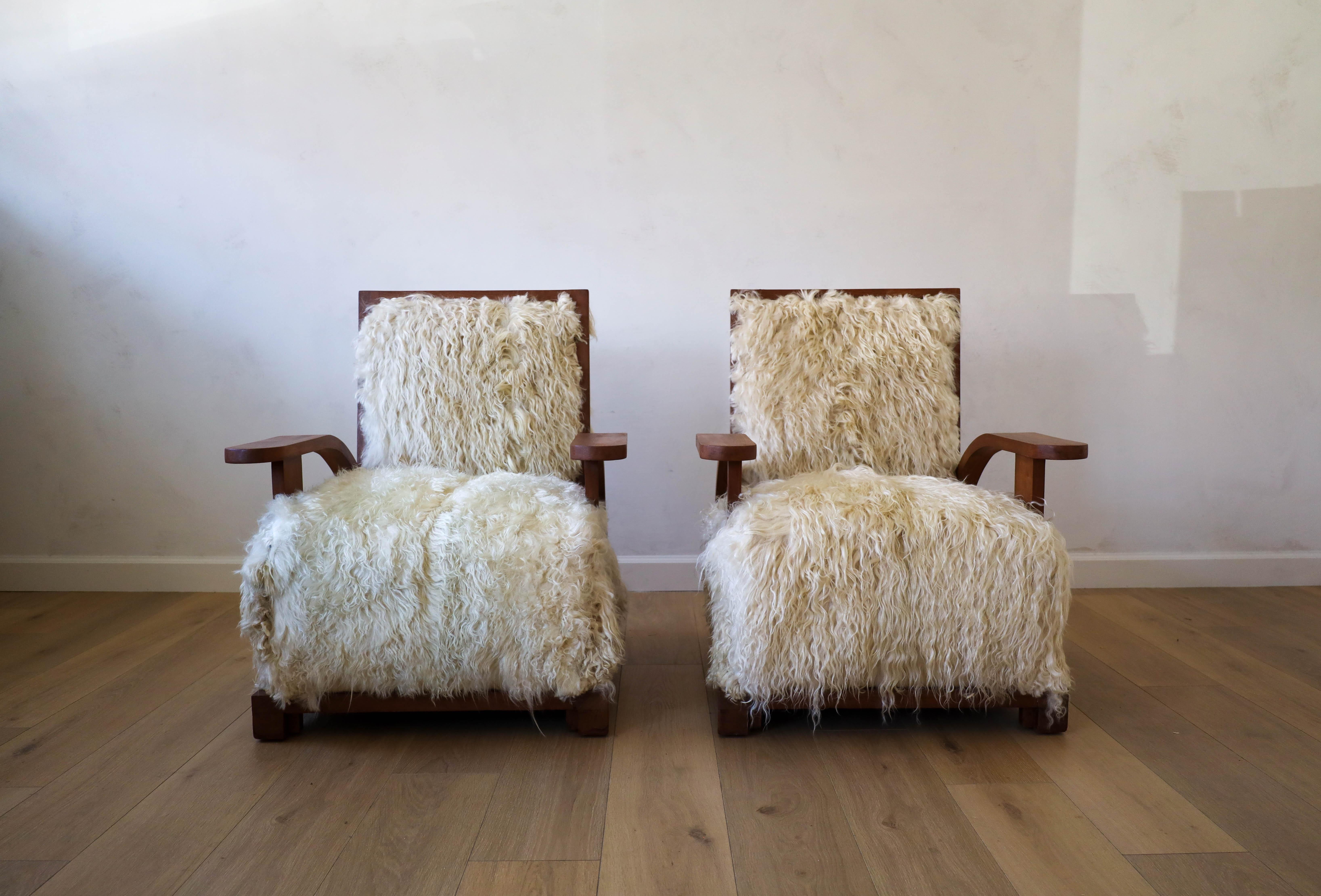 One of a kind Art Deco Club Chairs, reimagined in lush Angora Goatskin, certain to be the conversation piece of the room. We hand selected each individual hide that would be the perfect color and texture combination to compliment the refinished wood
