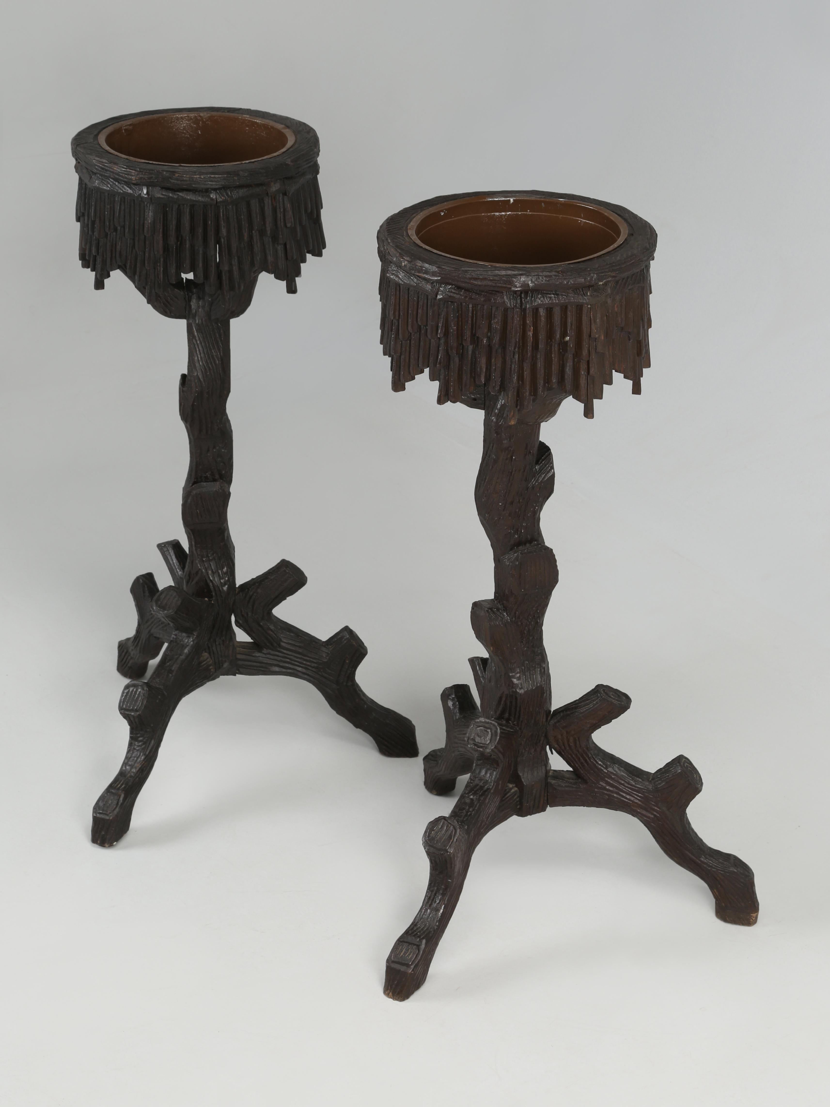 Black Forest Pair of Jardinière’s hand carved in Switzerland during the late 1800s. The Jardinière’s are complete with their original metal liners and are ready to be planted. Black Forest Furniture first began to appear in the mid-1800s in Brienz,