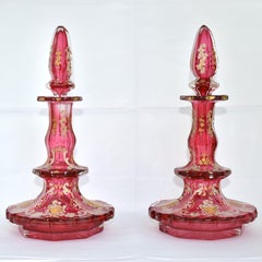 ANTIQUE PAIR OF BOHEMIAN CRANBERRY GLASS ENAMELLED PERFUME BOTTLES, 19th CENTURY
